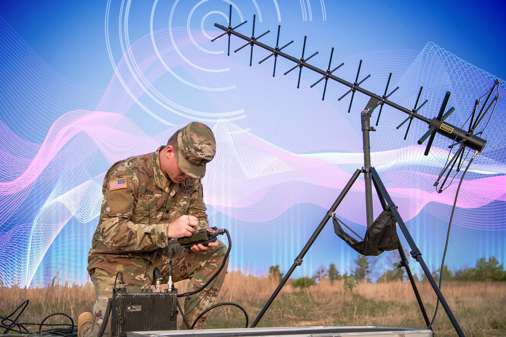 Photo of a military man in uniform using a mobile communications device