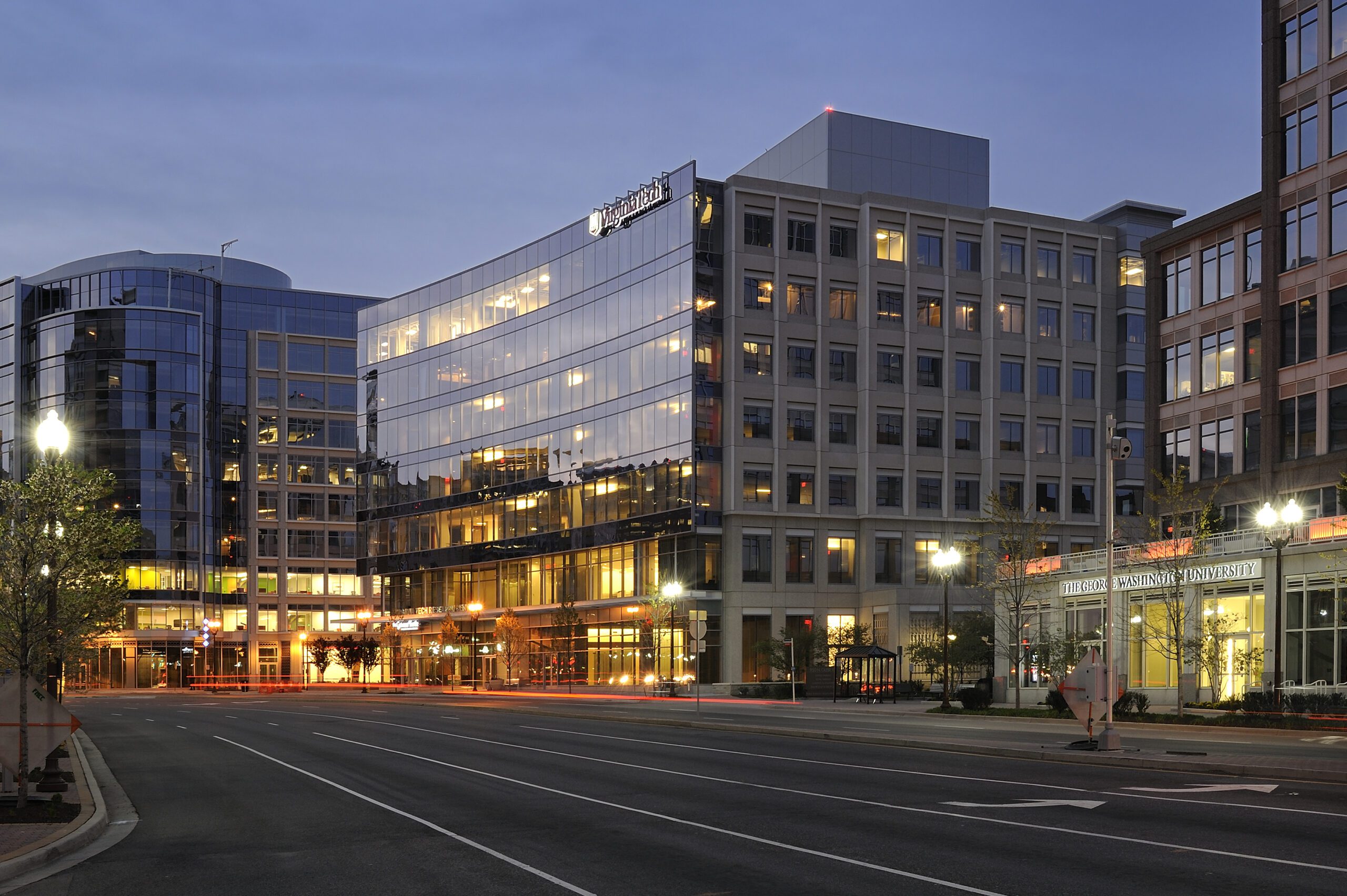 Photo of the Virginia Tech office building in Arlington Virginia at night.
