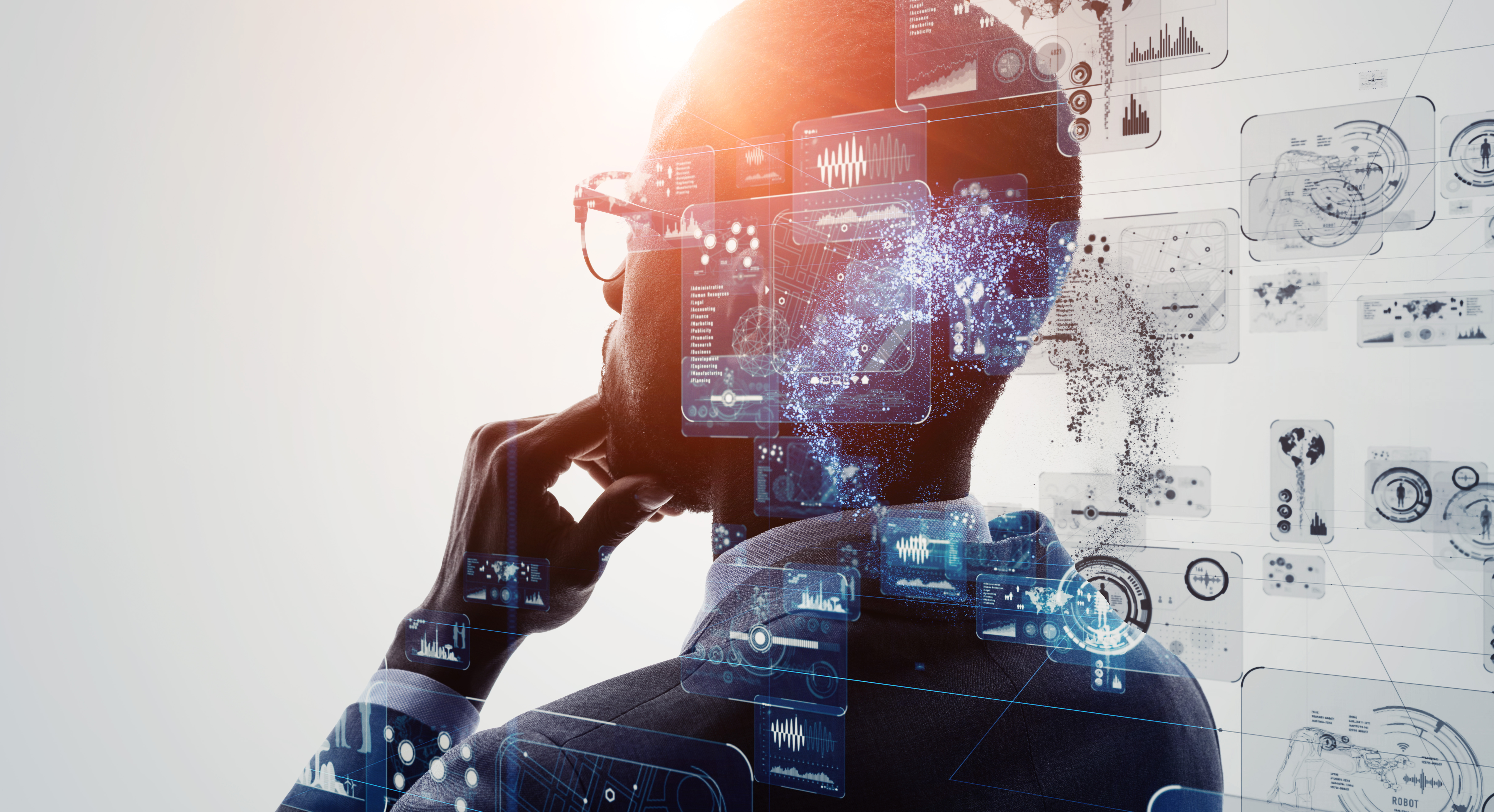 Image of a man thinking of technology, data, and innovation.